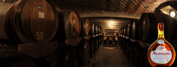 Oldering cellar (chai) and a bottle of Armagnac des Roys de France.